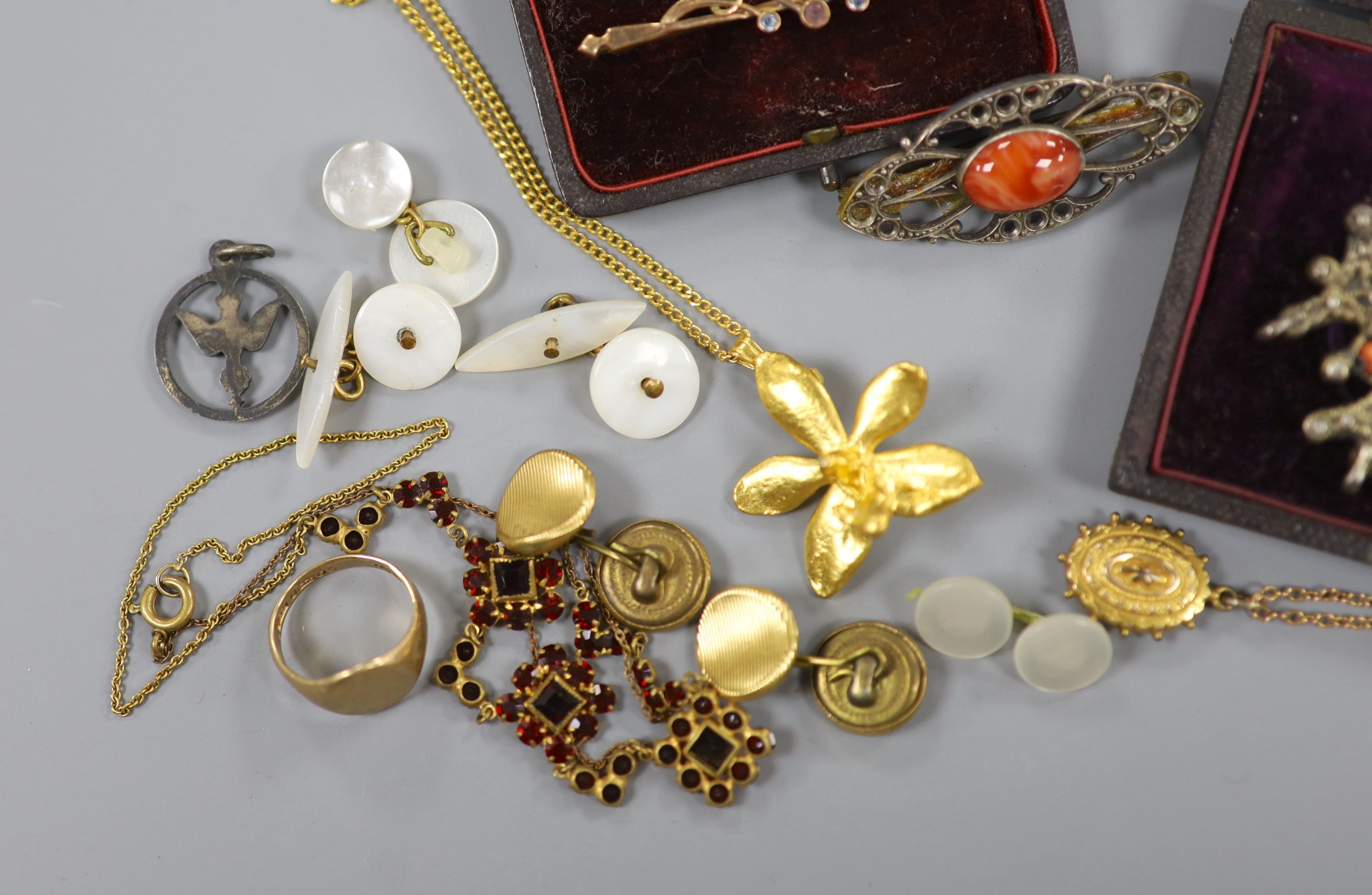 A 9ct gold signet ring, size L, 4.8 grams, a yellow metal locket on a 9ct chain, gross 4.2 grams and other minor jewellery.